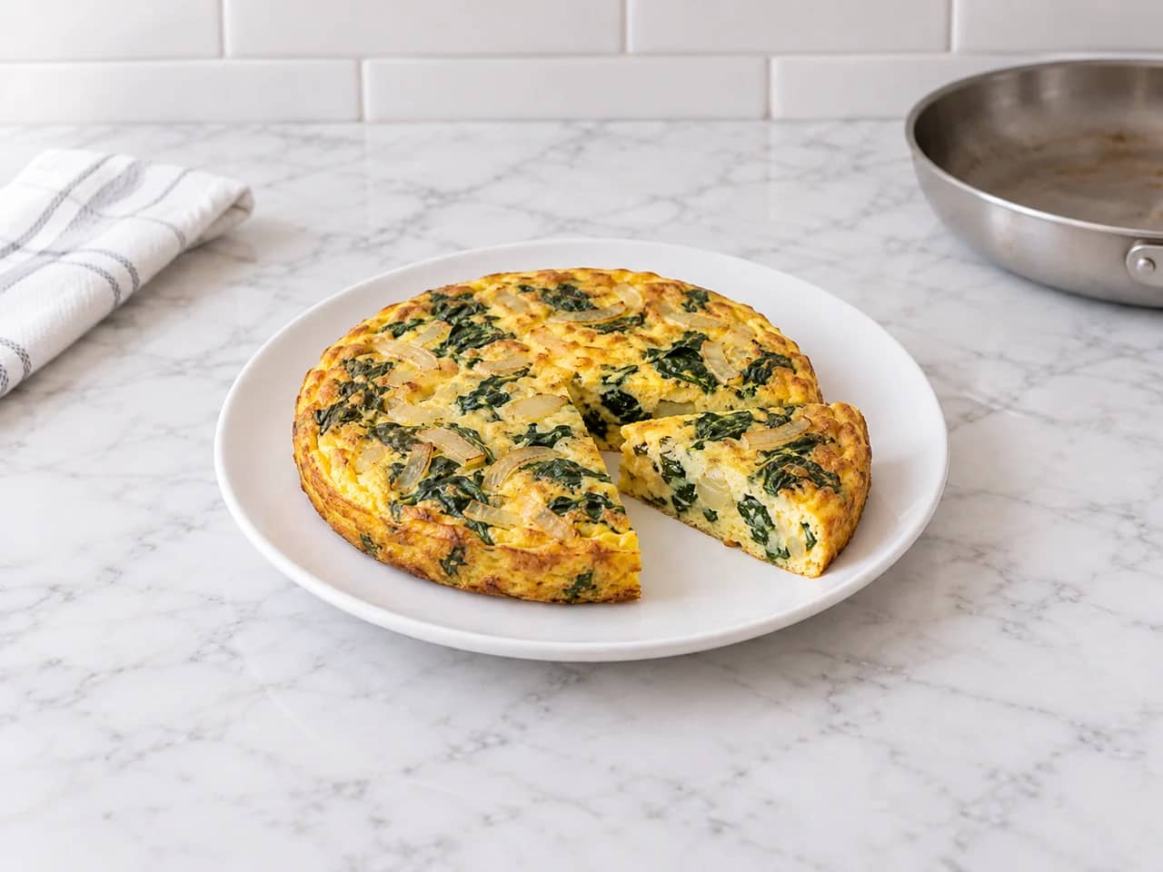 Imagem de Omelete de espinafre e cebola finalizada no forno